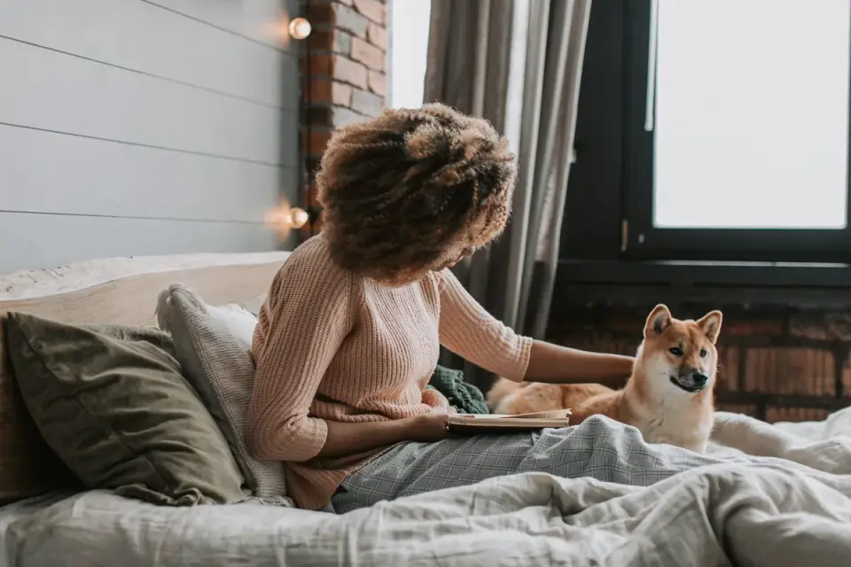 Dog owner at home