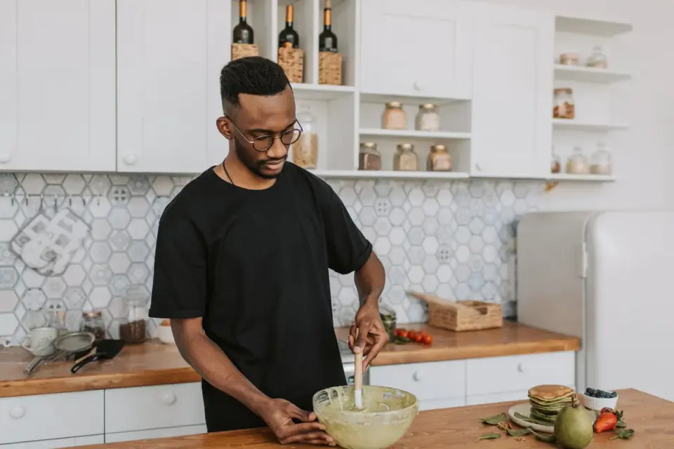 Dog owner preparing a meal