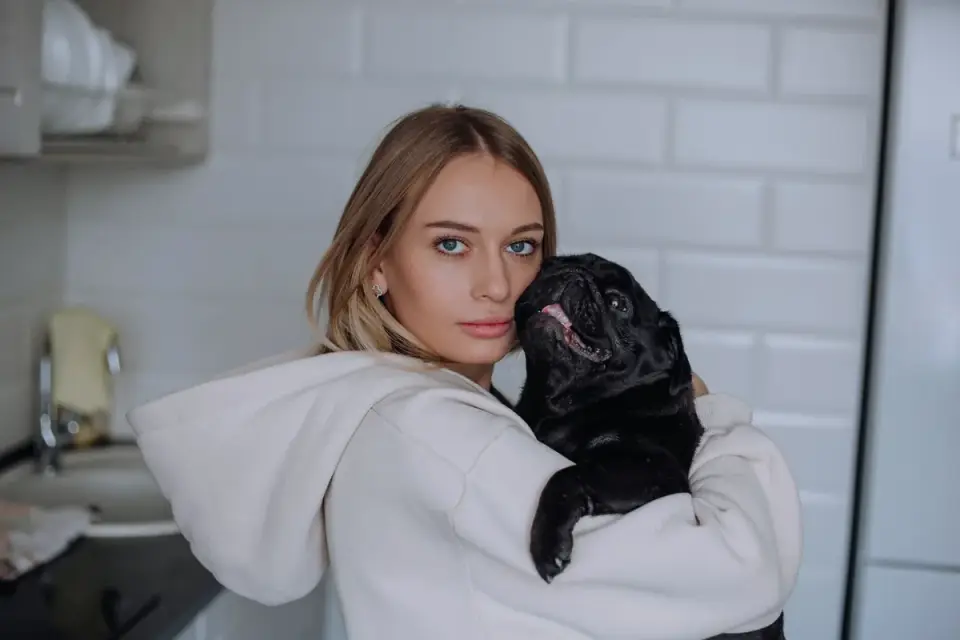 Dog owner preparing a meal