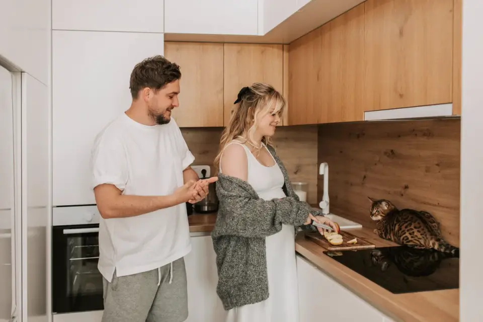 Dog owner preparing a meal