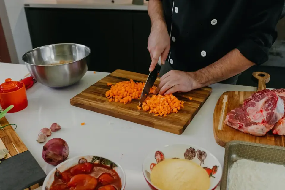 Dog owner preparing a meal