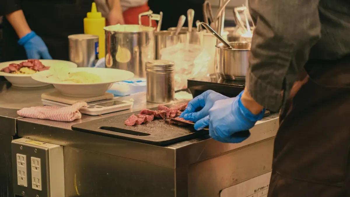 Dog owner preparing dog food kitchen