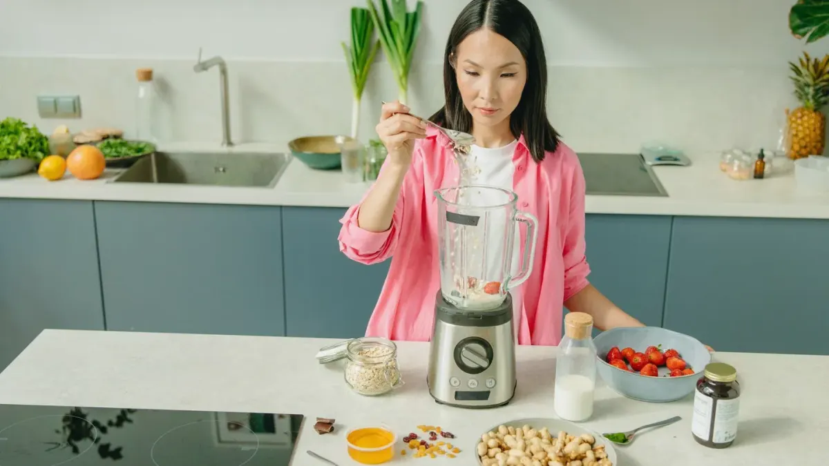 Dog owner preparing dog food kitchen