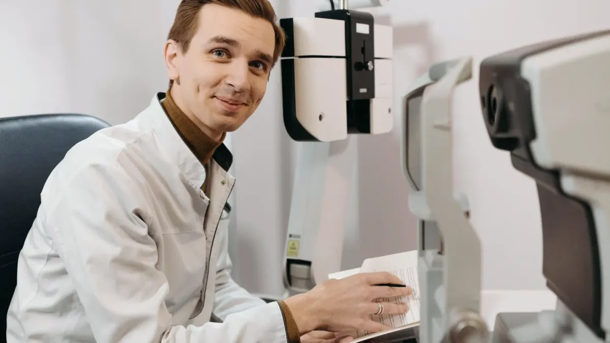 Veterinarian holding a supplement bottle while examining the ingredient panel